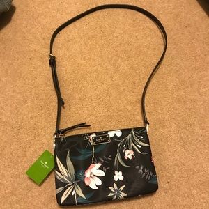 Kate spade crossbody with silver details